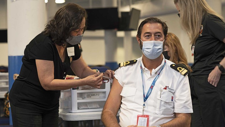 Carnival Captain Receiving Covid 19 Vaccine